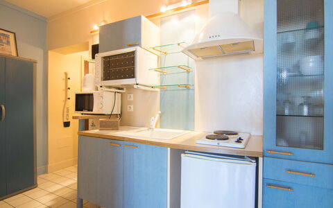 Balafen: Cabinetry, Kitchen Appliance, Kitchen Stove, Countertop, Kitchen, Home Appliance, Wood, Flooring, Interior Design, Refrigerator