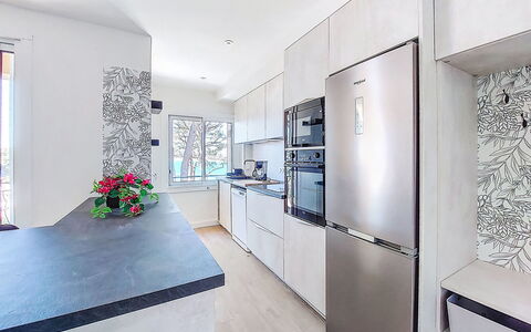 Les Goelands: Kitchen, Flooring, Countertop, Interior Design, Kitchen Appliance, Floor, Major Appliance, Wood, Furniture, Cabinetry