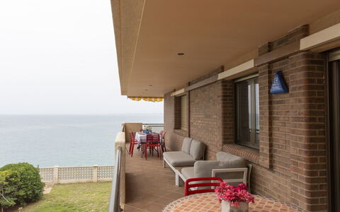Cala D'Or: Plant, Building, Sky, Table, Couch, Window, Water, Architecture, Chair, Shade