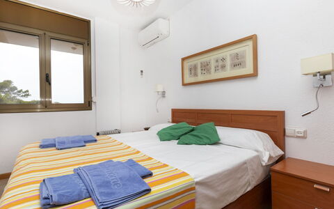 Cala D'Or: Building, Furniture, Property, Comfort, Azure, Wood, Textile, Window, Bed, Lighting