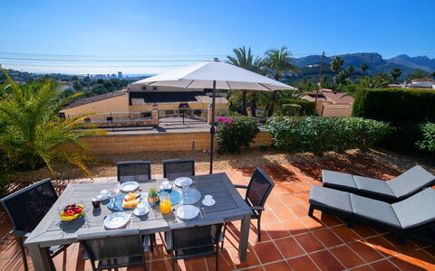 Calpe Calp 435: Sky, Table, Furniture, Property, Building, Plant, Shade, Chair, Outdoor Table, Outdoor Furniture