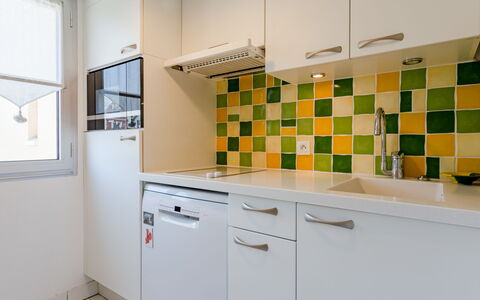 Les Terrasses du Casino: Cabinetry, Property, Building, Window, Kitchen, House, Interior Design, Floor, Flooring, Kitchen Appliance