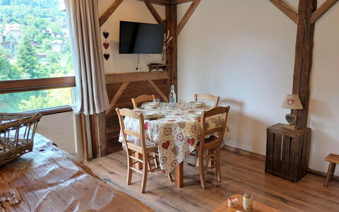 Saint Gervais 415: Table, Furniture, Wood, Interior Design, Floor, Wood Stain, Living Room, Flooring, Hardwood, Chair