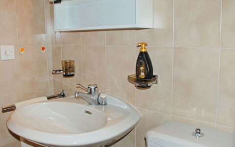 Vista Lago: Bathroom, Property, Room, Tap, Bathroom Sink, Tile, Wall, Sink, Bathroom Accessory, Bathroom Cabinet