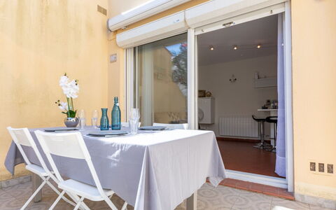 Les Cabestans 1,2,3: Furniture, Table, Property, Chair, Building, Interior Design, Tablecloth, Wood, Plant, Door