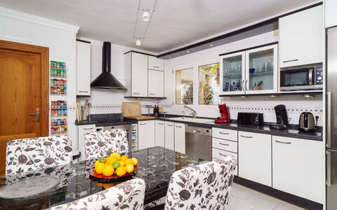 Bellevue: Cabinetry, Countertop, Furniture, Property, Kitchen Stove, Kitchen, Interior Design, Drawer, Home Appliance