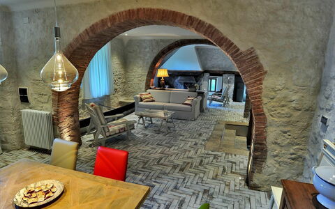 Agriturismo La Pieve: Arch, Room, Building, Architecture, Interior Design, Vault, Masonry Oven, House, Furniture, Living Room