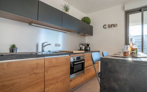 Rive Gauche: Cabinetry, Tap, Countertop, Kitchen Sink, Sink, Wood, Kitchen, Interior Design, Window, Kitchen Stove