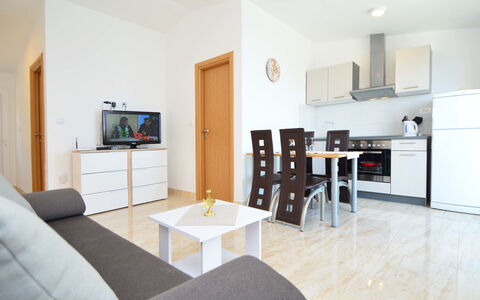 Trogir Okrug Gornji 313: Furniture, Table, Couch, House, Comfort, Flooring, Home Appliance, Living Room, Picture Frame, Floor