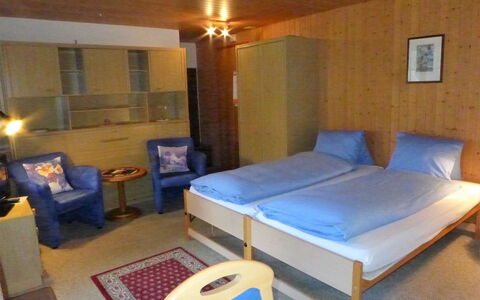 Grindelwald 570: Furniture, Property, Comfort, Building, Pillow, Interior Design, Wood, Bed Frame, Floor, Flooring