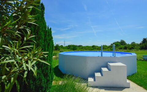 Martina: Property, Grass, Architecture, House, Tree, Real Estate, Design, Plant, Swimming Pool, Land Lot