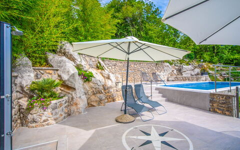 Koalas Nest Home & Apartments: Plant, Shade, Tree, Outdoor Furniture, Umbrella, Sunlounger, Urban Design, Sky, Building, Swimming Pool