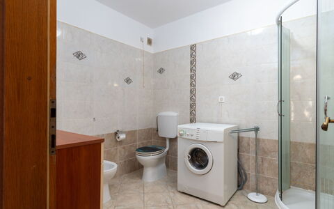 Melita Lara: Laundry Room, Property, Plumbing Fixture, Bathroom Cabinet, Bathroom, Clothes Dryer, Washing Machine, Building, House