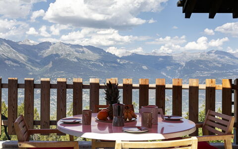 Chalet Mayens: Sky, Cloud, Table, Furniture, Property, Mountain, Chair, Light, Nature, Wood