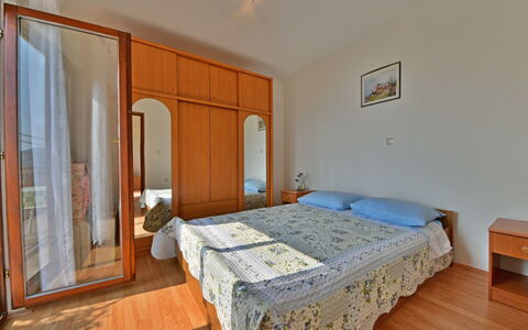 Tanja: Bedroom, Bed, Property, Room, Furniture, Floor, Building, Bed Frame, Bed Sheet, Ceiling