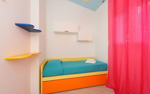 San Pietro Blue: Orange, Furniture, Room, Bed, Interior Design, Yellow, Property, Wall, Bedroom, Turquoise