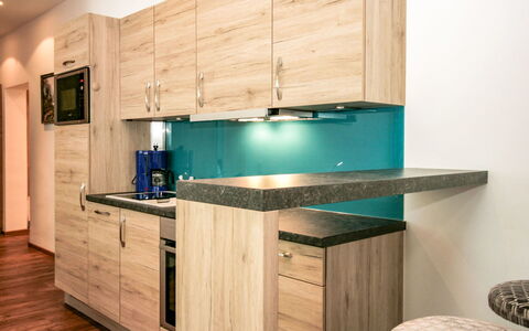 Irdning - Donnersbachtal 10: Countertop, Cabinetry, Room, Kitchen, Furniture, Property, Interior Design, Hardwood, Turquoise, House