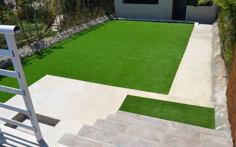 Sa Lluna: Grass, Lawn, Property, Artificial Turf, Courtyard, Backyard, Flooring, Landscaping, Yard, Floor
