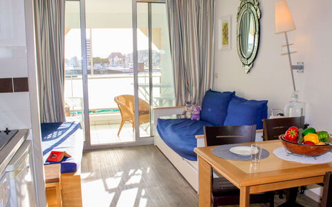 Le Beach: Table, Furniture, Property, Couch, Azure, Comfort, Textile, Interior Design, Floor, Lamp