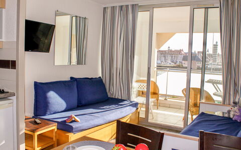 Le Beach: Table, Property, Furniture, Comfort, Couch, Azure, Textile, Wood, Pillow, Building