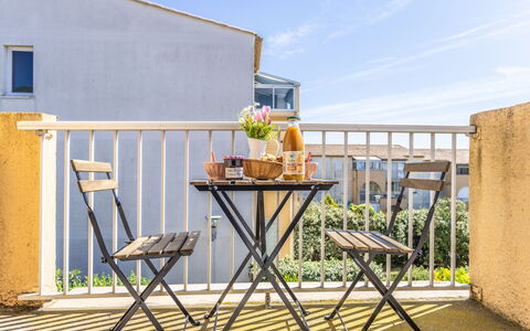 Les Raisins D'Or: Furniture, Outdoor Furniture, Chair, Table, Balcony, Outdoor Table, Porch, Folding Chair, Flowerpot, Fence