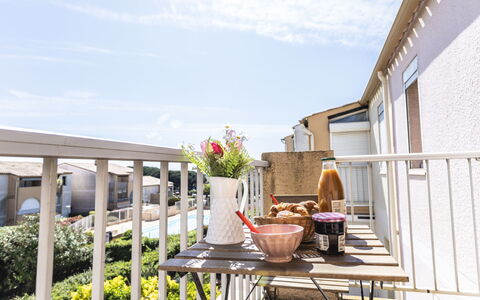 Les Raisins D'Or: Furniture, Apartment, Balcony, Chair, Flowerpot, Outdoor Table, Houseplant, Outdoor Furniture, Deck, Kitchen & Dining Room Table