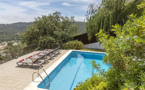 Paris: Water, Plant, Cloud, Sky, Property, Swimming Pool, Azure, Outdoor Furniture, Building, Tree