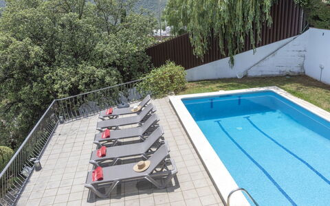 Paris: Property, Swimming Pool, Building, Plant, Outdoor Furniture, Tree, Shade, Rectangle, Wood, Urban Design