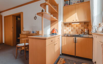 Schmuckstück 120.4: Cabinetry, Building, Property, Countertop, Drawer, Chair, Wood, Table, Kitchen, Flooring