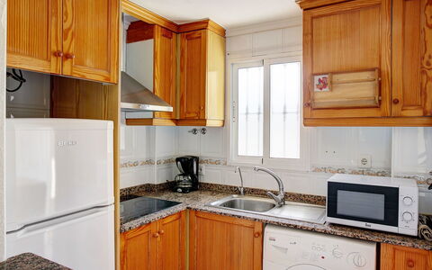 Residencial Daly: Countertop, Cabinetry, Room, Property, Kitchen, Furniture, Major Appliance, Building, House, Interior Design