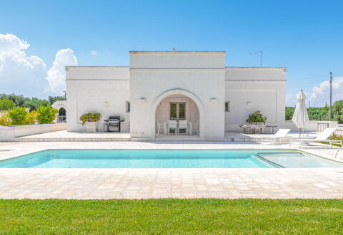 Il Casalino - Corte Dei Messapi: Sky, Plant, Water, Property, Cloud, Azure, Rectangle, Grass, Swimming Pool, Building