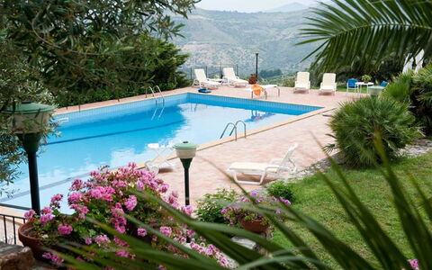 Villa Ivoni: Property, Swimming Pool, Resort, Vacation, Real Estate, House, Building, Grass, Leisure, Villa