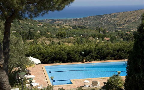 Villa Ivoni: Swimming Pool, Property, Azure, Vacation, House, Villa, Resort, Tree, Real Estate, Estate