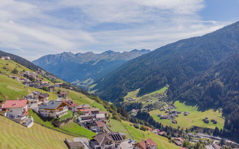 Sailer: Cloud, Sky, Mountain, Natural Landscape, Slope, House, Land Lot, Highland, Terrain, Grass