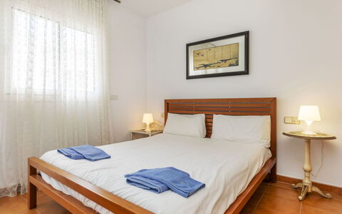 Punta Garbí: Bed, Furniture, Bedroom, Flooring, Floor, Interior Design, Bedding, Bed Sheet, Wood, Wood Flooring