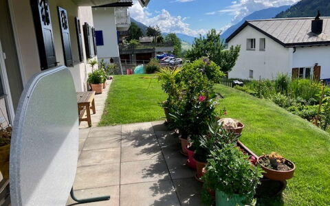 Casa Acla Caduff: Plant, Sky, Flowerpot, Building, Cloud, Houseplant, Grass, Neighbourhood, Window, Residential Area