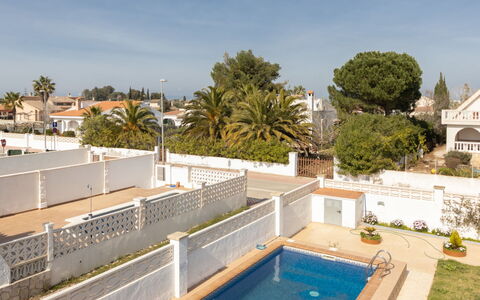 Sandra: Sky, Daytime, Property, Plant, Building, Tree, Cloud, Swimming Pool, Leisure, Urban Design