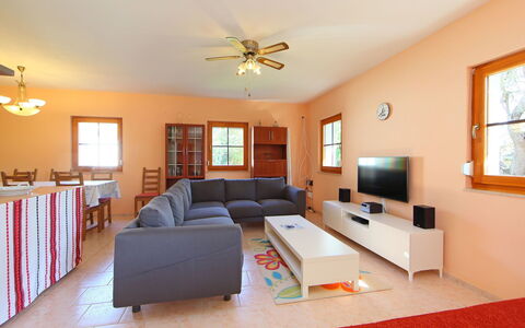 Golf Tee: Room, Property, Furniture, Living Room, Building, Interior Design, Floor, Ceiling, House, Real Estate