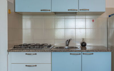 Vista Playa 3 (Goa603) 710.3: Cabinetry, Countertop, Tap, Kitchen Stove, Kitchen Sink, Drawer, Kitchen, Kitchen Appliance, Interior Design, Wood