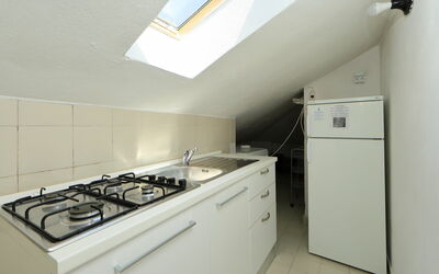 Vista Playa 1 710.1: Countertop, Cabinetry, Building, Kitchen Appliance, Gas Stove, Kitchen Stove, Cooktop, Home Appliance, Kitchen, Stove