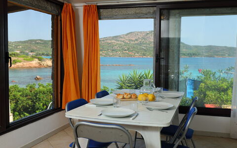 Tritone: Property, Room, Interior Design, Table, Furniture, Real Estate, Building, House, Vacation, Shore
