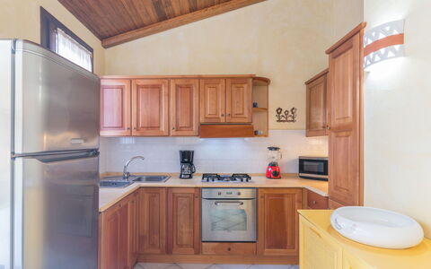 Dalila: Cabinetry, Property, Furniture, Countertop, Sink, Kitchen Sink, Wood, Kitchen, Kitchen Stove, Interior Design