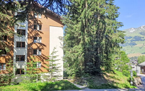 Bruyères A32: Plant, Sky, Building, Blue, Window, Land Lot, Larch, Evergreen, Road Surface, Urban Design