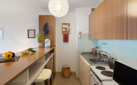 Bruyères A32: Interior Design, Furniture, Flooring, Wood, Countertop, Ceiling, Floor, Light Fixture, Kitchen, Room