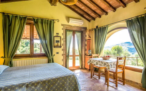 Casale Belvedere: Plant, Furniture, Building, Property, Window, Comfort, Curtain, Wood, Textile, Shade