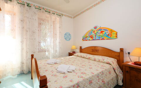 Bouganville: Bedroom, Bed, Room, Furniture, Property, Bed Sheet, Bedding, Bed Frame, Interior Design, Wall