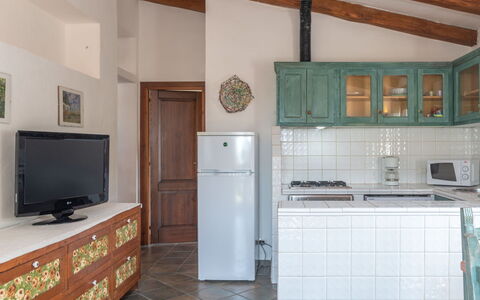 Sibilla: Cabinetry, Property, Furniture, Home Appliance, Television, Kitchen Appliance, Kitchen Stove, Kitchen, Countertop, Wood