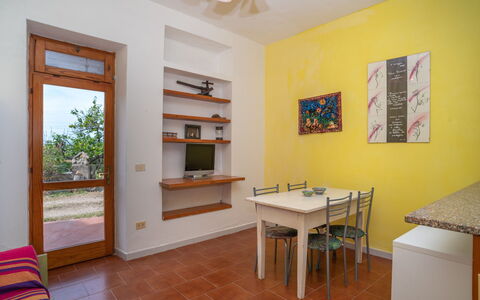 Valledoria 731: Furniture, Property, Table, Building, Wood, Orange, Interior Design, Lighting, Architecture, House