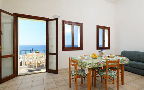 Valledoria 735: Furniture, Building, Table, Azure, Couch, Wood, Window, Water, Rectangle, House