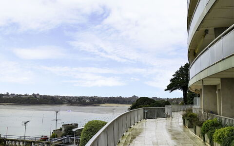La Baie: Cloud, Water, Sky, Plant, Building, Lake, Window, City, Grass, Tree
